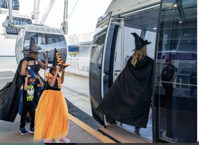 184 witches riding the Orlando Eye for Halloween celebration